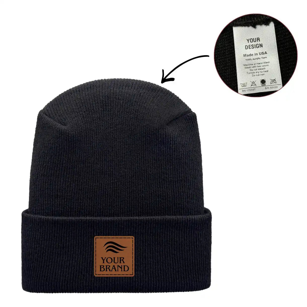 Black beanie with brown leather patch and tag on a white background